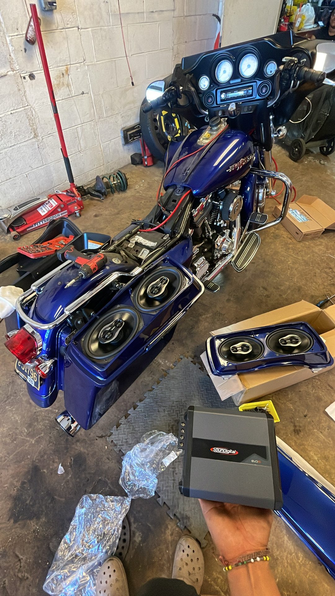 Mobile One Audio workshop — custom motorcycle audio build in progress