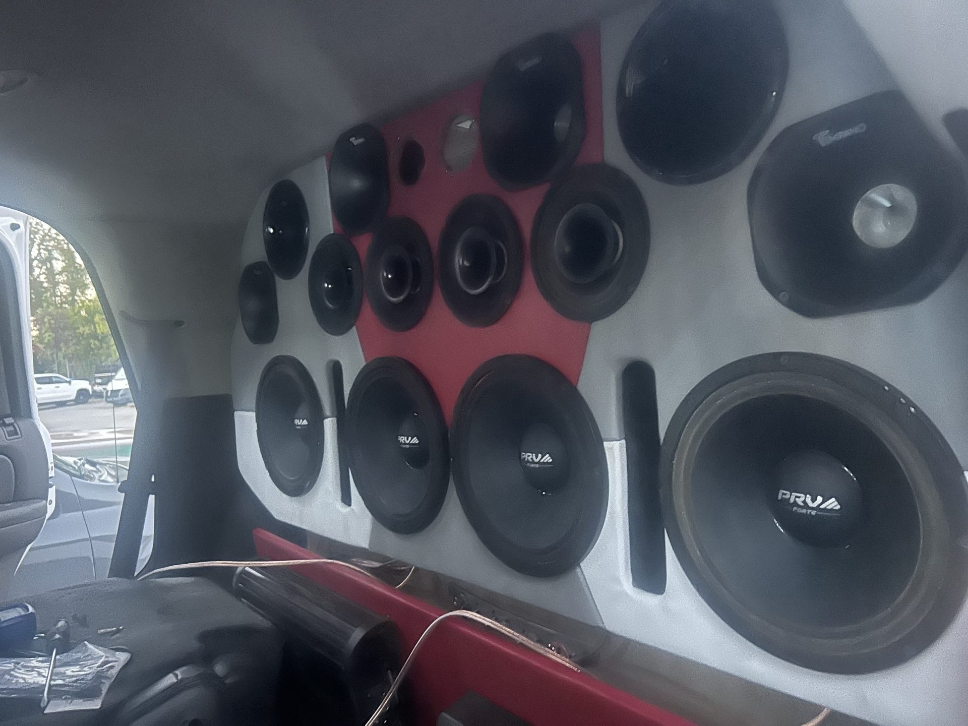 Custom speaker wall build by Mobile One Audio
